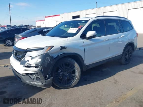 2021 Honda Pilot Black Edition z VIN 5FNYF6H77MB027077, wystawiony jako IAAI lot #41916296 z przebiegiem 81 653 mil mil oraz . Historia ofert i sprzedaży dostępna na DreamBid. Obrazek 2.