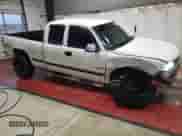 2001 Chevrolet Silverado 1500 LS z VIN 1GCEK19VX1E208377, wystawiony jako Copart lot #83016454 z przebiegiem 104 764 mil mil oraz Szkoda całkowita • Salvage title. Historia ofert i sprzedaży dostępna na DreamBid. Obrazek 4.