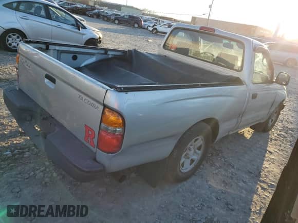 2003 Toyota Tacoma with VIN 5TENL42NX3Z150327, listed as a Copart auction lot 41579785 with 187,714 mi miles and Salvage title. Bid and sale history available at DreamBid. Image 3.