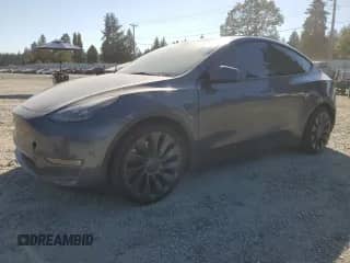 2023 Tesla Model Y Performance z VIN 7SAYGDEF8PF938071, wystawiony jako Copart lot #80581955 z przebiegiem 26 137 mil mil oraz Szkoda całkowita • Salvage title. Historia ofert i sprzedaży dostępna na DreamBid. Obrazek 1.