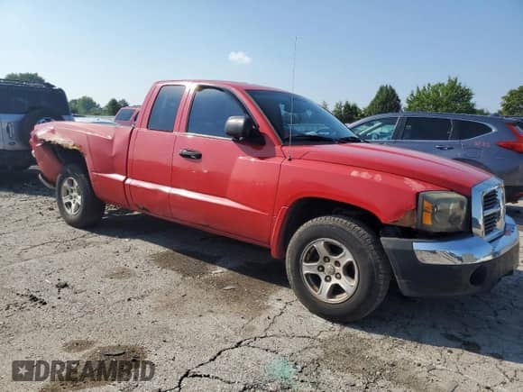 2005 Dodge Dakota SLT with VIN 1D7HW42K25S309641, listed as a Copart auction lot 68941465 with 191,221 mi miles and Salvage title. Bid and sale history available at DreamBid. Image 4.