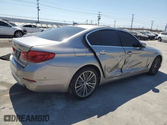 2018 BMW 5 Series 530i с VIN WBAJA5C54JWA38447, выставлен на аукционе Copart как лот 66904645 с пробегом Не указан миль и Списание • Salvage title. История ставок и продаж доступна на DreamBid. Изображение 3.