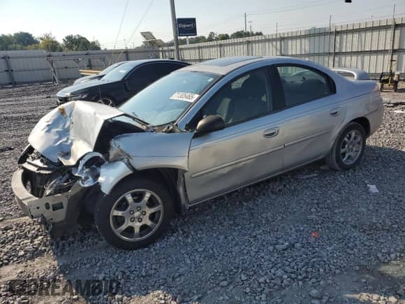 2004 Dodge Neon SXT with VIN 1B3ES56C94D560985, listed as a Copart auction lot 71305465 with 44,077 mi miles and Salvage title. Bid and sale history available at DreamBid. Image 1.