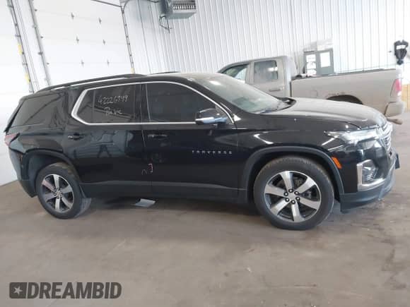 2023 Chevrolet Traverse LT with VIN 1GNEVHKW7PJ322847, listed as a IAAI auction lot 42226999 with 20,333 mi miles and . Bid and sale history available at DreamBid. Image 13.