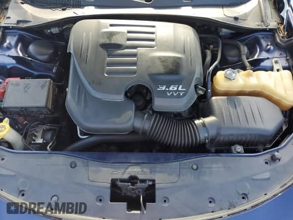 2015 Dodge Charger SE with VIN 2C3CDXBG3FH839993, listed as a Copart auction lot 70147505 with 162,671 mi miles and Salvage title. Bid and sale history available at DreamBid. Image 11.