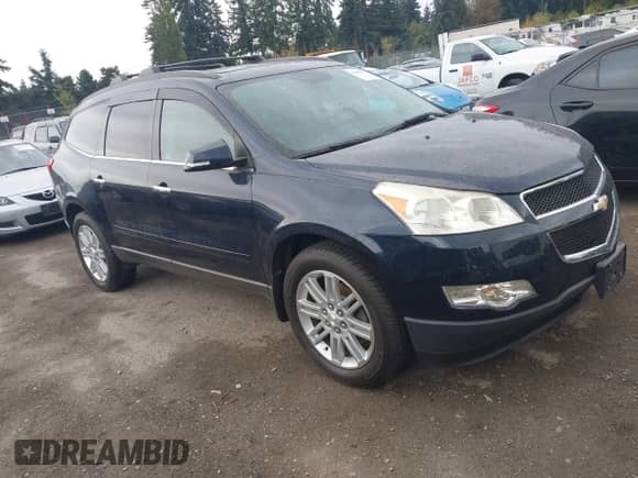 2012 Chevrolet Traverse 2LT with VIN 1GNKVJED7CJ325973, listed as a IAAI auction lot 43405773 with 145,472 mi miles and . Bid and sale history available at DreamBid. Image 1.