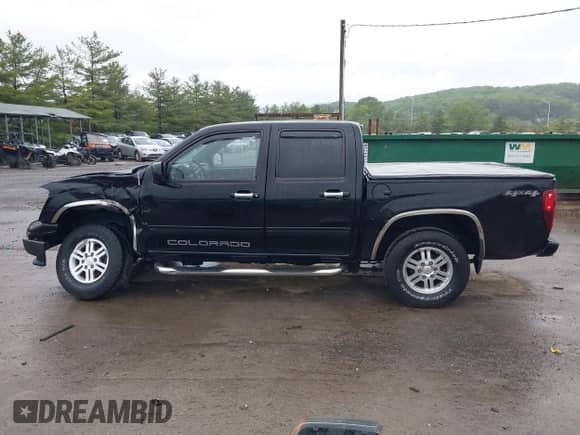 2012 Chevrolet Colorado 1LT с VIN 1GCHTCFEXC8165154, выставлен на аукционе IAAI как лот 42301986 с пробегом 166 527 миль миль и . История ставок и продаж доступна на DreamBid. Изображение 15.