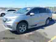 2019 Honda Odyssey EX-L with VIN 5FNRL6H73KB073550, listed as a IAAI auction lot 41666490 with 40,518 mi miles and . Bid and sale history available at DreamBid. Image 2.