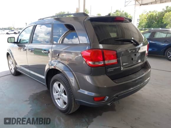 2017 Dodge Journey SXT with VIN 3C4PDDBG6HT525261, listed as a IAAI auction lot 42989064 with 99,904 mi miles and . Bid and sale history available at DreamBid. Image 3.