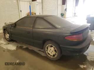 1996 Saturn SC с VIN 1G8ZF1280TZ139117, выставлен на аукционе Copart как лот 73220274 с пробегом Не указан миль и Списание • Salvage title. История ставок и продаж доступна на DreamBid. Изображение 2.