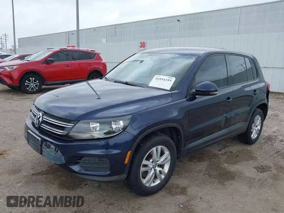 2013 Volkswagen Tiguan SE z VIN WVGAV3AX9DW613283, wystawiony jako IAAI lot #41954359 z przebiegiem 147 525 mil mil oraz . Historia ofert i sprzedaży dostępna na DreamBid. Obrazek 2.
