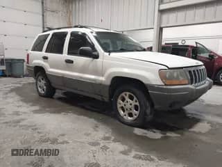 1999 Jeep Grand Cherokee Laredo z VIN 1J4GW58N9XC785616, wystawiony jako IAAI lot #42781613 z przebiegiem Nie podano mil oraz . Historia ofert i sprzedaży dostępna na DreamBid. Obrazek 1.