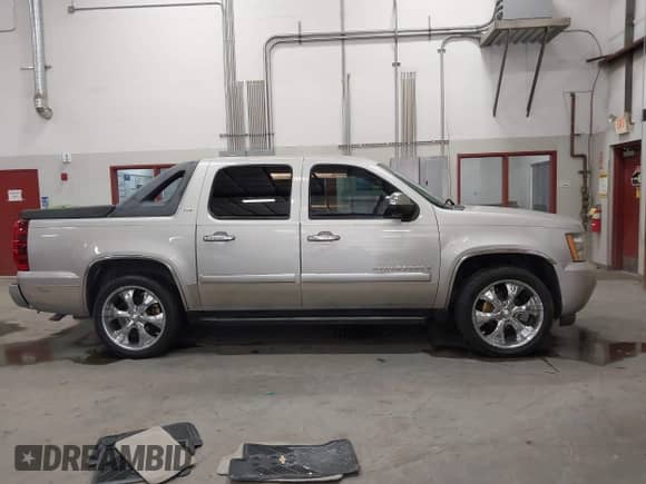 2007 Chevrolet Avalanche LTZ with VIN 3GNEC12037G144865, listed as a IAAI auction lot 42592982 with 160,962 mi miles and . Bid and sale history available at DreamBid. Image 13.