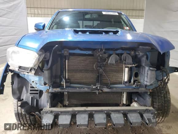 2016 Toyota Tacoma SR z VIN 5TFCZ5AN1GX006627, wystawiony jako Copart lot #58051785 z przebiegiem 211 989 mil mil oraz Szkoda całkowita • Salvage title. Historia ofert i sprzedaży dostępna na DreamBid. Obrazek 5.