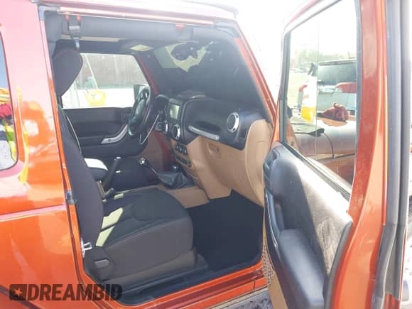 2014 Jeep Wrangler Sahara with VIN 1C4AJWBG4EL158586, listed as a IAAI auction lot 43220489 with 36,662 mi miles and . Bid and sale history available at DreamBid. Image 5.