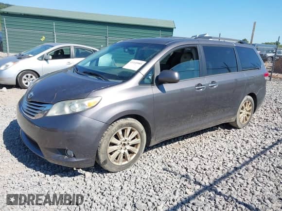 2012 Toyota Sienna XLE with VIN 5TDDK3DC1CS045290, listed as a IAAI auction lot 43145985 with 212,749 mi miles and . Bid and sale history available at DreamBid. Image 2.