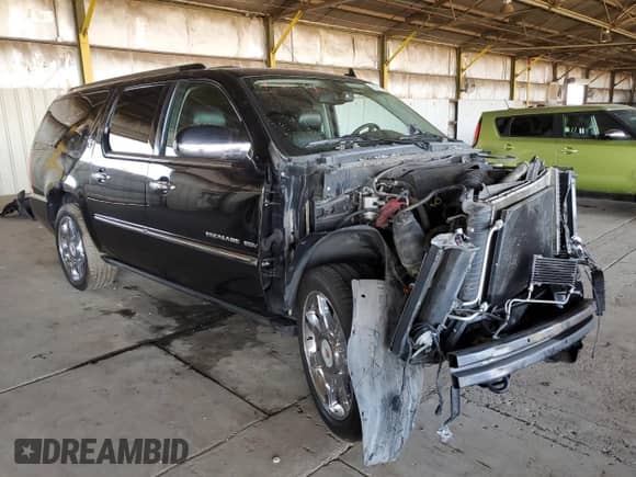 2010 Cadillac Escalade ESV Premium with VIN 1GYUKJEF5AR100794, listed as a Copart auction lot 61217194 with Not provided miles and Salvage title. Bid and sale history available at DreamBid. Image 4.