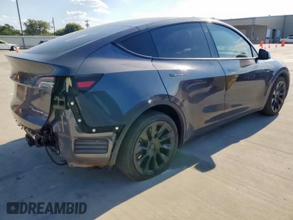 2021 Tesla Model Y Long Range с VIN 5YJYGDEE9MF209058, выставлен на аукционе Copart как лот 84481235 с пробегом 81 252 миль миль и Списание • Salvage title. История ставок и продаж доступна на DreamBid. Изображение 3.