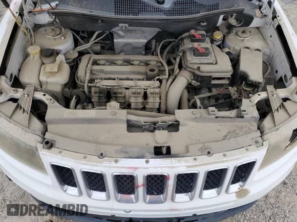 2014 Jeep Compass Sport z VIN 1C4NJCBA2ED548222, wystawiony jako Copart lot #84583235 z przebiegiem Nie podano mil oraz Czysty tytuł • Clean title. Historia ofert i sprzedaży dostępna na DreamBid. Obrazek 11.