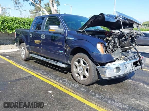 2013 Ford F-150 Lariat with VIN 1FTFW1CT5DKD65353, listed as a IAAI auction lot 43359505 with 145,422 mi miles and . Bid and sale history available at DreamBid. Image 1.