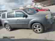 2014 Honda Pilot EX-L with VIN 5FNYF4H57EB001695, listed as a IAAI auction lot 43284018 with 150,075 mi miles and . Bid and sale history available at DreamBid. Image 13.