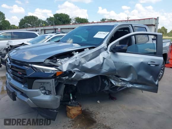 2023 Chevrolet Colorado 4WD Z71 with VIN 1GCPTDEK3P1235293, listed as a IAAI auction lot 42927062 with 31,492 mi miles and . Bid and sale history available at DreamBid. Image 2.