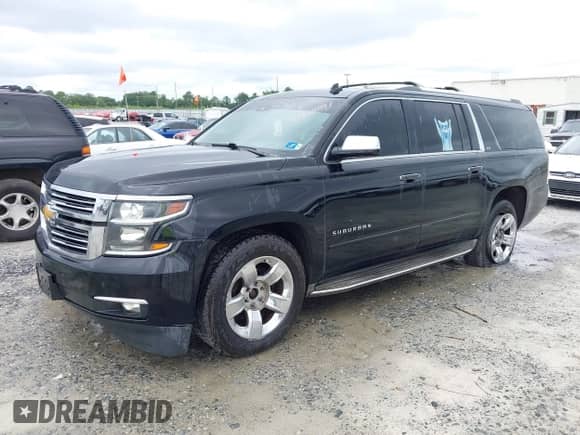 2015 Chevrolet Suburban LTZ z VIN 1GNSKKKC0FR119748, wystawiony jako IAAI lot #42932991 z przebiegiem 283 577 mil mil oraz . Historia ofert i sprzedaży dostępna na DreamBid. Obrazek 2.