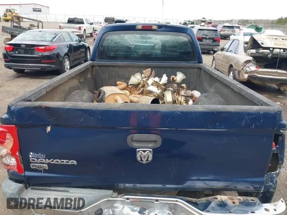 2005 Dodge Dakota with VIN 1D7HE52K05S157464, listed as a IAAI auction lot 41253448 with 325,703 mi miles and . Bid and sale history available at DreamBid. Image 16.