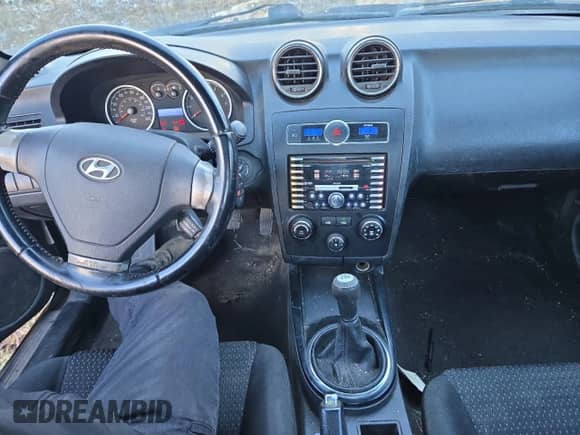 2008 Hyundai Tiburon GS with VIN KMHHM65D08U281366, listed as a Copart auction lot 80868694 with 283,883 mi miles and Salvage title. Bid and sale history available at DreamBid. Image 8.