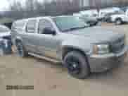 2007 Chevrolet Suburban LT z VIN 1GNFC16057R413155, wystawiony jako IAAI lot #41884665 z przebiegiem 205 038 mil mil oraz . Historia ofert i sprzedaży dostępna na DreamBid. Obrazek 1.