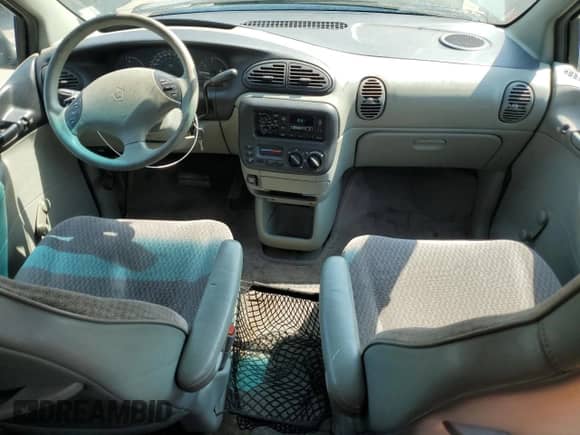 1999 Dodge Caravan with VIN 2B4GP25R6XR415186, listed as a Copart auction lot 68574285 with 179,611 mi miles and Clean title. Bid and sale history available at DreamBid. Image 8.