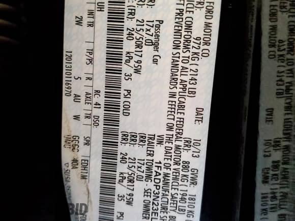 2014 Ford Focus Titanium z VIN 1FADP3N23EL192924, wystawiony jako Copart lot #85731195 z przebiegiem 145 225 mil mil oraz Szkoda całkowita • Salvage title. Historia ofert i sprzedaży dostępna na DreamBid. Obrazek 12.