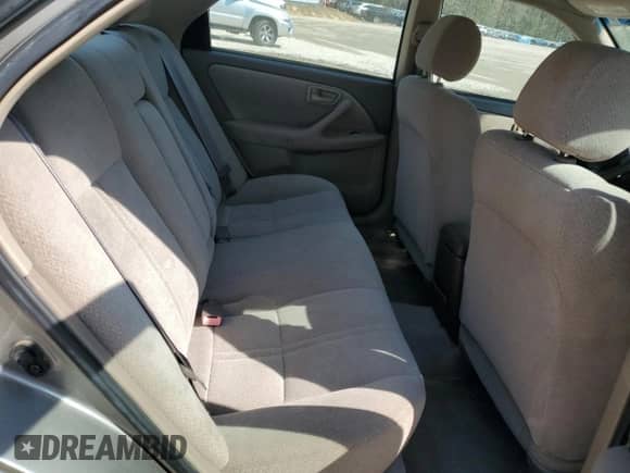 2001 Toyota Camry LE z VIN 4T1BG22K41U072727, wystawiony jako Copart lot #50954225 z przebiegiem 96 411 mil mil oraz Szkoda całkowita • Salvage title. Historia ofert i sprzedaży dostępna na DreamBid. Obrazek 10.