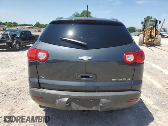 2010 Chevrolet Traverse 1LT with VIN 1GNLVFED3AS138545, listed as a Copart auction lot 61566595 with 100,988 mi miles and Salvage title. Bid and sale history available at DreamBid. Image 6.