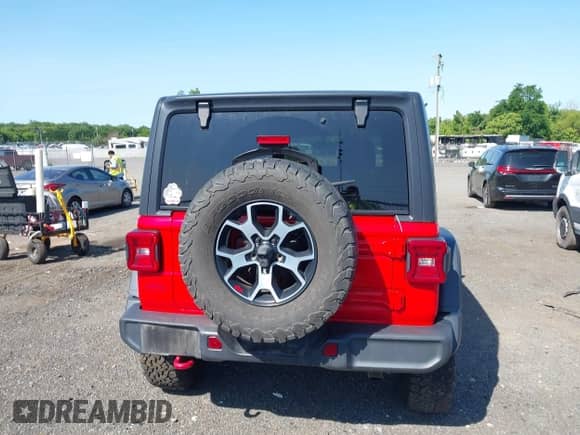 2021 Jeep Wrangler Unlimited Rubicon with VIN 1C4HJXFG2MW575541, listed as a IAAI auction lot 42247475 with 92,353 mi miles and . Bid and sale history available at DreamBid. Image 17.
