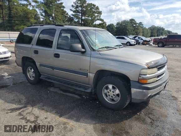 2002 Chevrolet Tahoe LT with VIN 1GNEC13Z02J101895, listed as a Copart auction lot 85274875 with 280,761 mi miles and Salvage title. Bid and sale history available at DreamBid. Image 4.