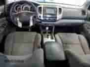 2014 Toyota Tacoma с VIN 5TFMU4FN4EX025885, выставлен на аукционе Copart как лот 89492635 с пробегом 161 136 миль миль и Списание • Salvage title. История ставок и продаж доступна на DreamBid. Изображение 8.