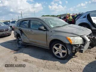 2007 Dodge Caliber R/T with VIN 1B3HB78K97D150415, listed as a IAAI auction lot 43267027 with 210,429 mi miles and . Bid and sale history available at DreamBid. Image 1.