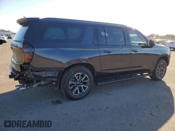 2022 Chevrolet Suburban с VIN 1GNSKDKL0NR301797, выставлен на аукционе Copart как лот 45292695 с пробегом 20 779 миль миль и Списание • Salvage title. История ставок и продаж доступна на DreamBid. Изображение 3.