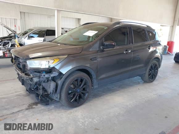 2018 Ford Escape SE with VIN 1FMCU9GD9JUB36955, listed as a IAAI auction lot 43434236 with 134,129 mi miles and . Bid and sale history available at DreamBid. Image 2.