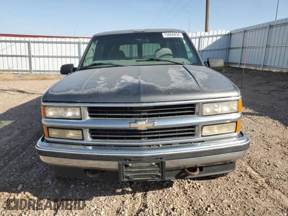 1999 Chevrolet Suburban с VIN 1GNFK16R4XJ483035, выставлен на аукционе Copart как лот 76666034 с пробегом 215 048 миль миль и Чистый • Clean title. История ставок и продаж доступна на DreamBid. Изображение 5.