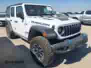 2024 Jeep Wrangler Rubicon with VIN 1C4RJXR60RW223430, listed as a IAAI auction lot 43343638 with 53,374 mi miles and . Bid and sale history available at DreamBid. Image 1.