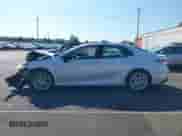 2020 Toyota Camry Hybrid XLE z VIN 4T1F31AK1LU541672, wystawiony jako IAAI lot #43125531 z przebiegiem 207 911 mil mil oraz . Historia ofert i sprzedaży dostępna na DreamBid. Obrazek 14.