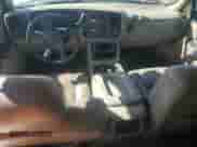 2004 GMC Sierra 1500 SLT z VIN 1GTEK19T64E137004, wystawiony jako Copart lot #66133455 z przebiegiem 232 841 mil mil oraz Szkoda całkowita • Salvage title. Historia ofert i sprzedaży dostępna na DreamBid. Obrazek 8.