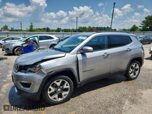 2020 Jeep Compass Limited with VIN 3C4NJCCB2LT187511, listed as a Copart auction lot 63769235 with 100,436 mi miles and Salvage title. Bid and sale history available at DreamBid. Image 1.