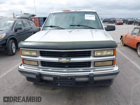 1994 Chevrolet Suburban with VIN 1GNFK16K2RJ314685, listed as a IAAI auction lot 43390934 with 191,930 mi miles and . Bid and sale history available at DreamBid. Image 6.