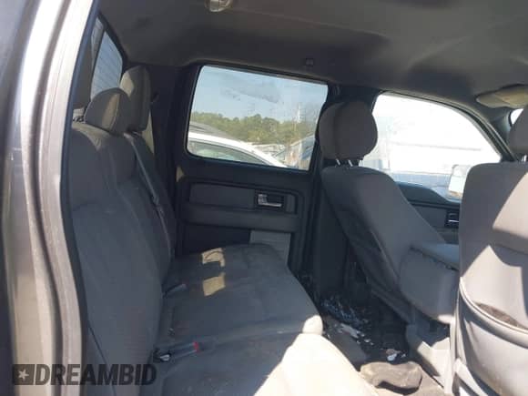 2013 Ford F-150 Lariat with VIN 1FTFW1ET5DFC93463, listed as a IAAI auction lot 43182949 with 133,397 mi miles and . Bid and sale history available at DreamBid. Image 8.