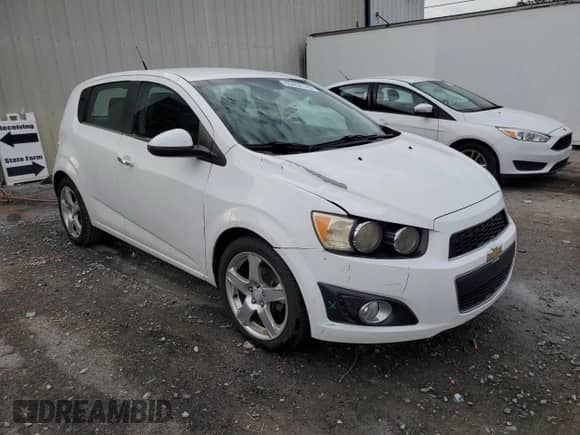 2013 Chevrolet Sonic LTZ with VIN 1G1JE6SB5D4203691, listed as a Copart auction lot 65452745 with 60,070 mi miles and Salvage title. Bid and sale history available at DreamBid. Image 4.
