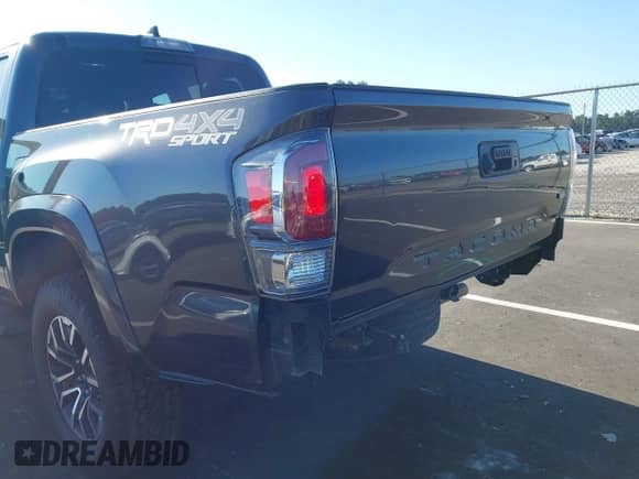 2020 Toyota Tacoma SR5 with VIN 3TMCZ5AN8LM296929, listed as a IAAI auction lot 43118349 with 68,020 mi miles and . Bid and sale history available at DreamBid. Image 6.