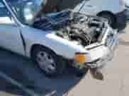 1996 Honda Accord EX z VIN 1HGCE6679TA020995, wystawiony jako IAAI lot #42204592 z przebiegiem 198 263 mil mil oraz . Historia ofert i sprzedaży dostępna na DreamBid. Obrazek 13.